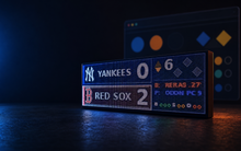 FieldFire Standard three-panel LED scoreboard with browser control in a dark high-tech studio.